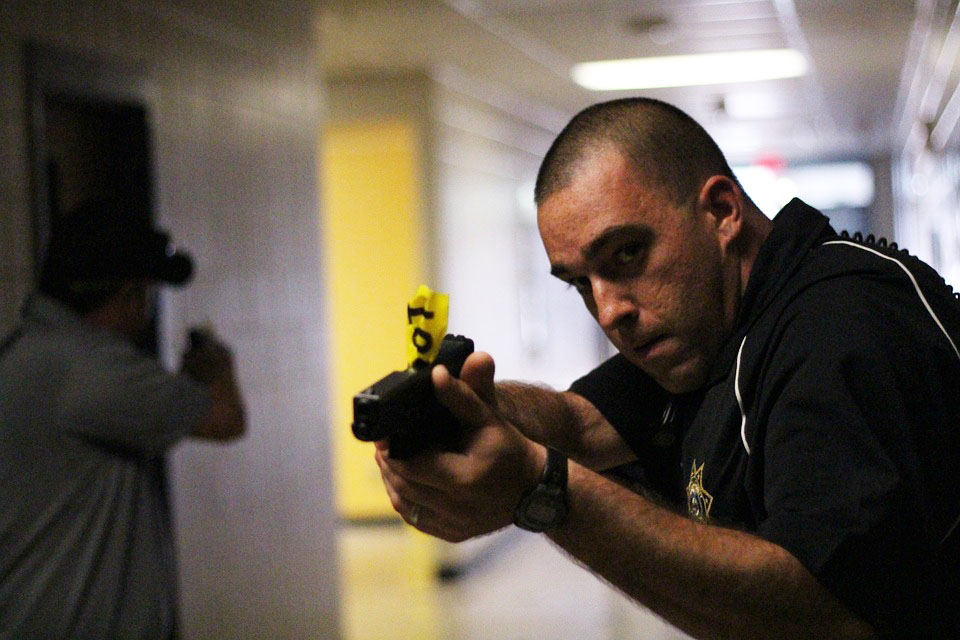image of a police officer on the scene of an active shooter situation